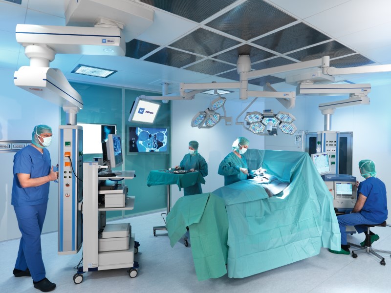 Physicians working in an OR department to care for ill patient
