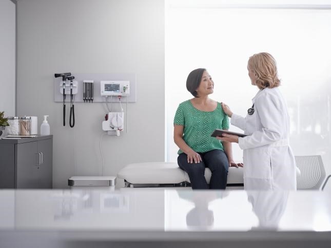 Physician working in primary care to care for ill patient