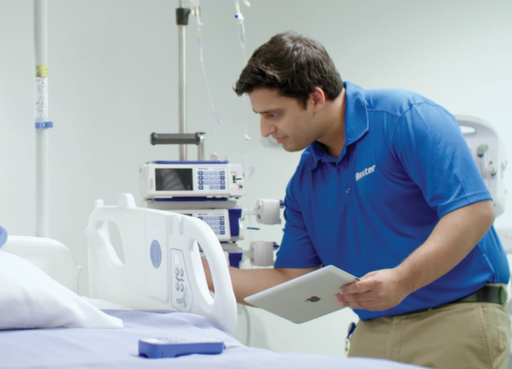 Technician looking at a smart bed setup