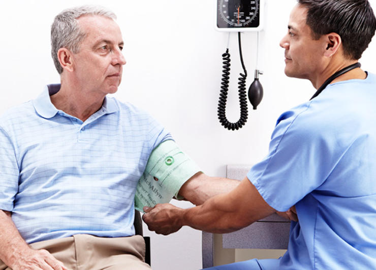 Nurse taking BP readings in an Emergency Room