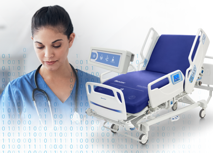 A nurse and the Hillrom900 bed.