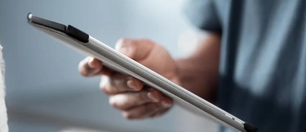 Man holding a tablet